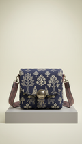 Crossbody bag with folklore embossing